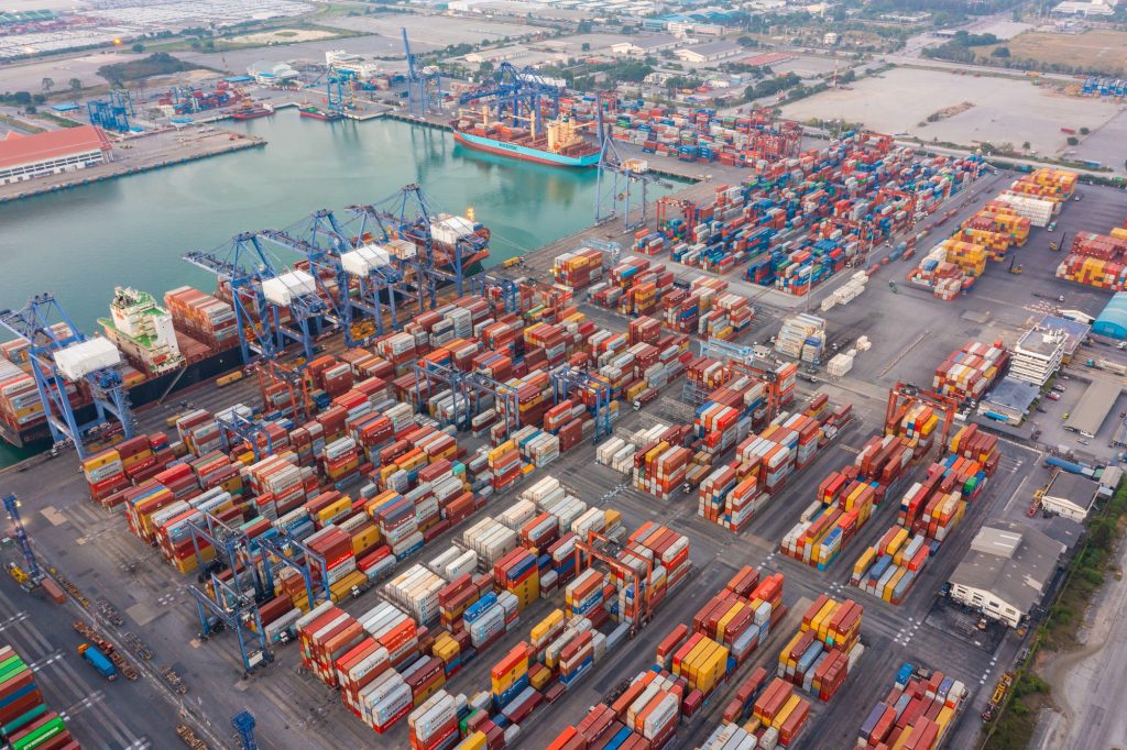 Aerial top view of container cargo ship in the export and import business and logistics